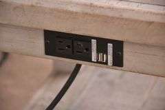 Pair of distressed two-tier side tables with built-in power strips; 1153-093