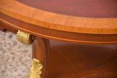Kindel round inlaid mahogany coffee table; 4779-003