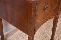 Inlaid crotch mahogany serpentine front sideboard; 74-12887