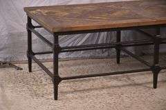 Black iron coffee table with distressed barnwood top; 1152-107