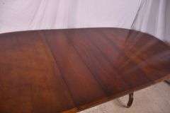 Oval mahogany double pedestal dining table with 3 leaves; 18301-001