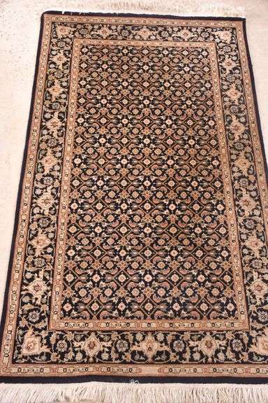 3.0'x5.1' hand knotted rug with navy field; 68-7333