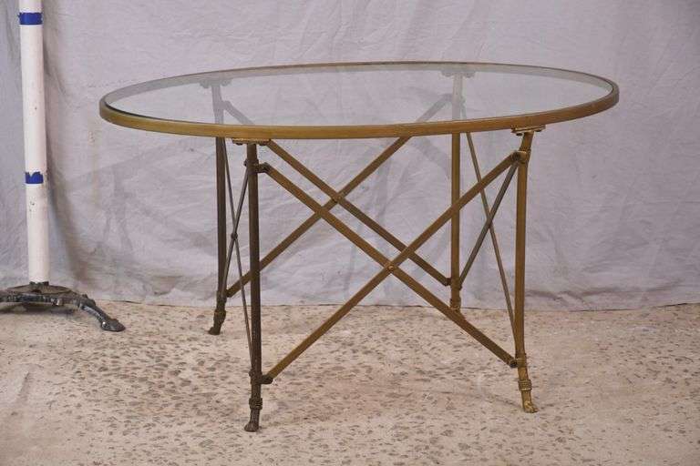 Oval gold metal coffee table with glass top; 68-7291