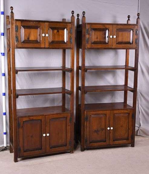 Pair of pine open front displays with 2 raised panel doors on tops and ...