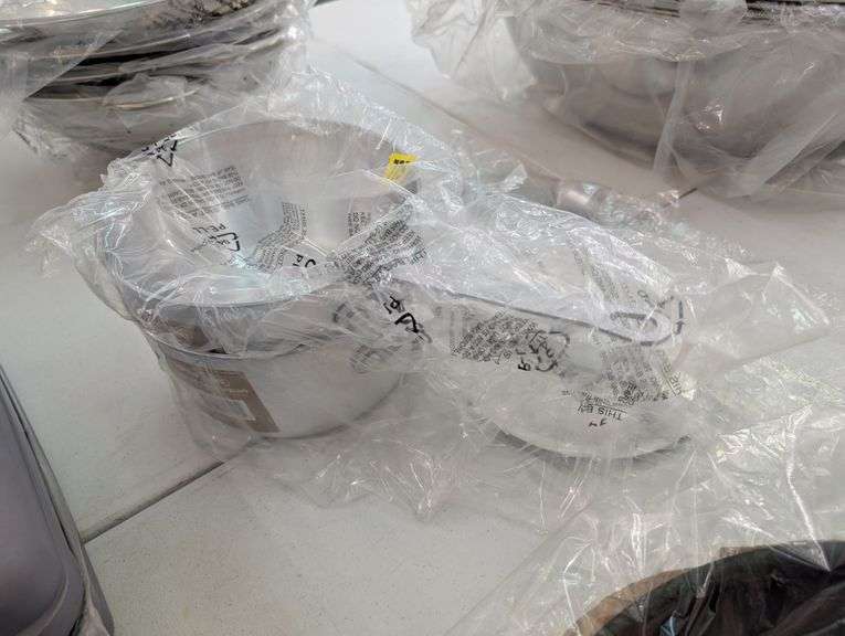 Lot of two aluminum pro standard taper sauce pans with lids