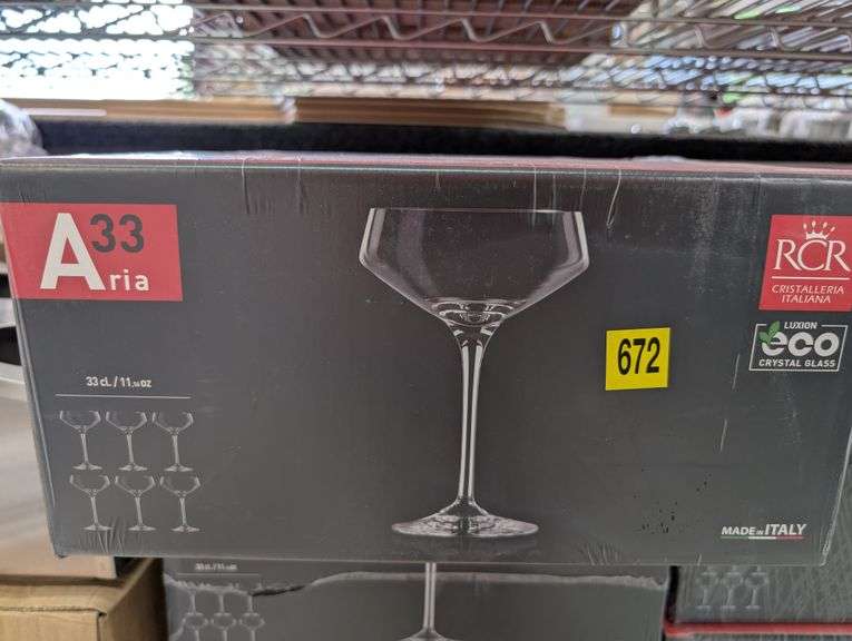 Large lot of 27 boxes of Aria 33 wine glasses.