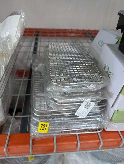 A lot of 14 various sized stainless steel pan-grates