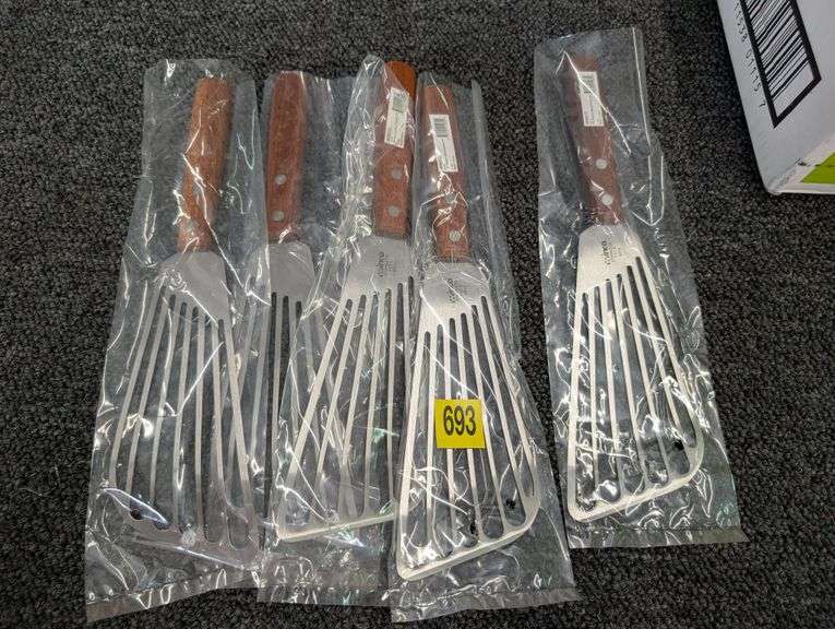 Lot of five Winco fish spatulas