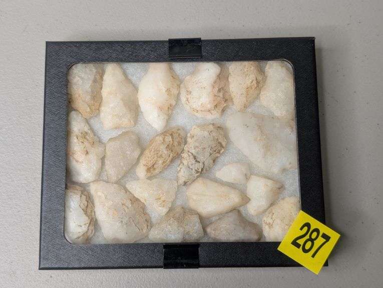 Collection of 20 Quartz Arrowhead Points in Display