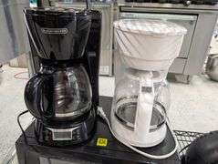 Lot of microwave, coffee makers, and fan.