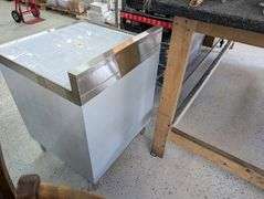 Klinger's under bar open storage with drain. NEW