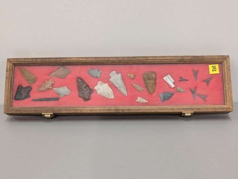 Collection of 23 arrowhead points and other artifacts