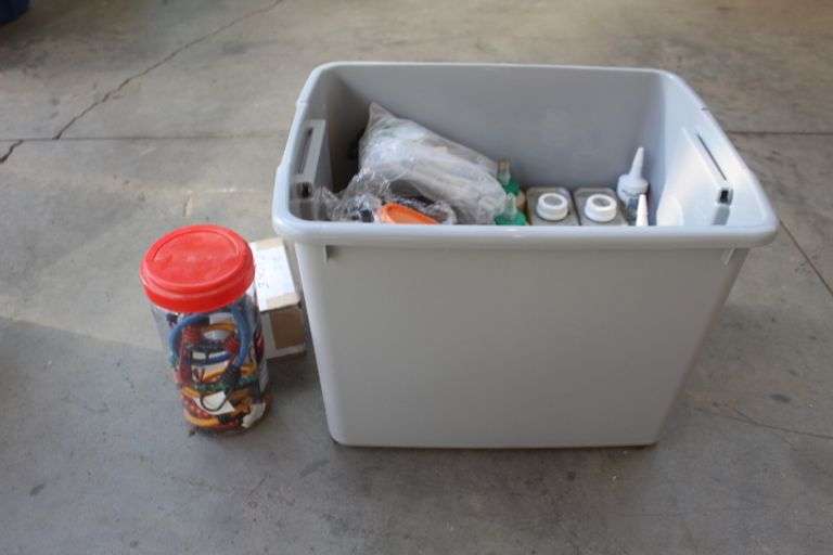 Tote of wood glue & mineral spirits Lee Real Estate & Auction Service