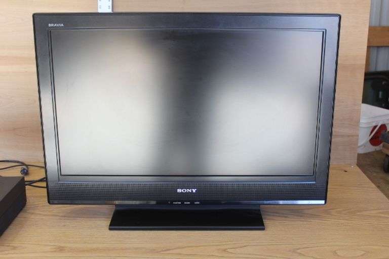 Sony 32" flat screen TV w/VHS player & remotes Lee Real Estate