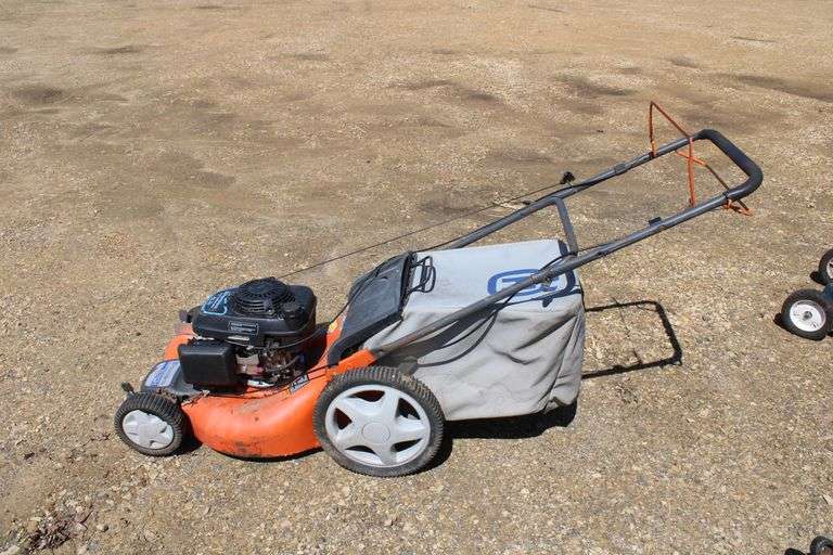 Husqvarna push mower w/bagger Lee Real Estate & Auction Service