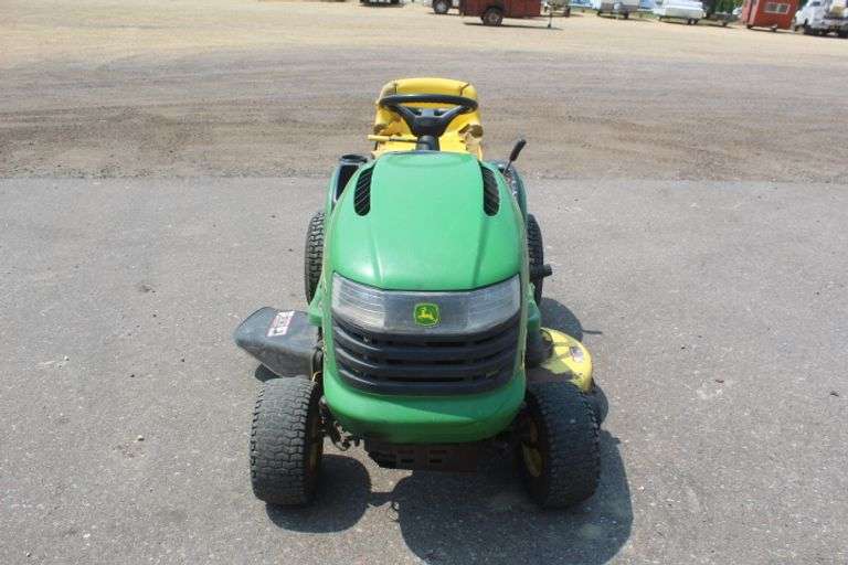 John Deere riding lawn mower