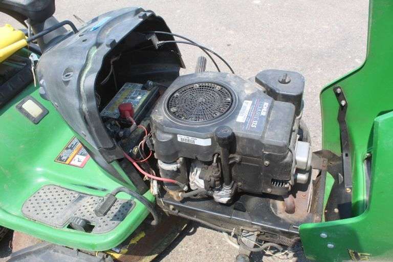 John Deere riding lawn mower