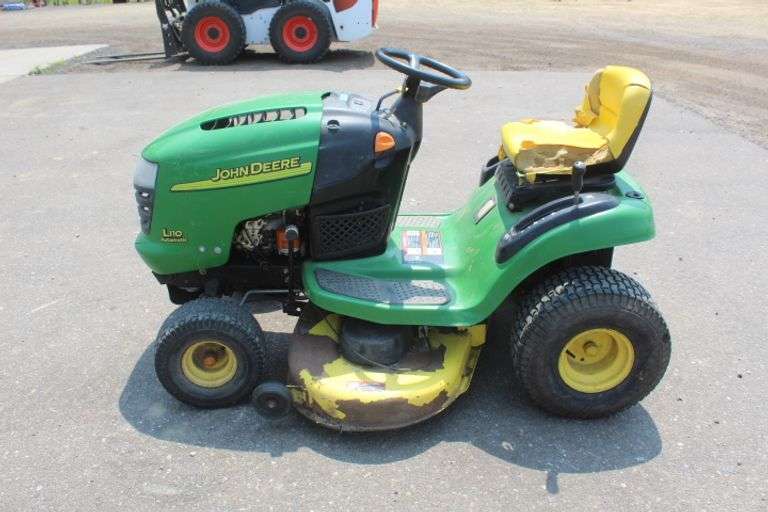 John Deere riding lawn mower