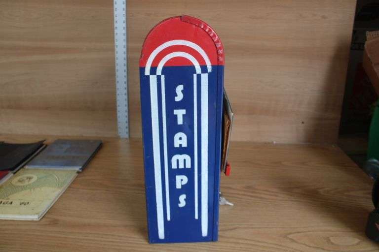 Wall mount metal stamp dispenser