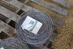 2 new rolls of barbed wire