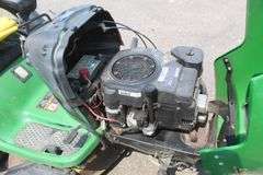 John Deere riding lawn mower