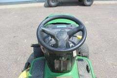 John Deere riding lawn mower