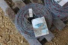 2 new rolls of barbed wire