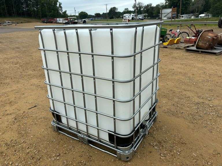 325 gal. poly tote in metal cage