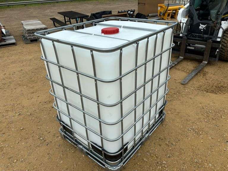 325 gal. poly tote in metal cage
