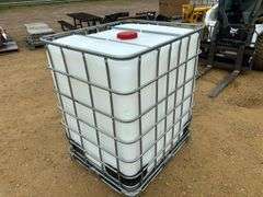 325 gal. poly tote in metal cage