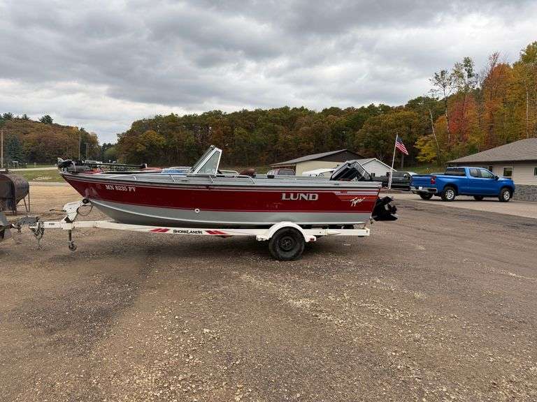 1991 Lund fishing boat w/motor & trailer