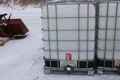 325 gal. poly tote in metal cage