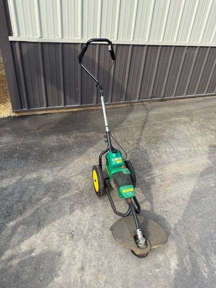 Weed Eater Wheeled Trimmer - Lee Real Estate & Auction Service