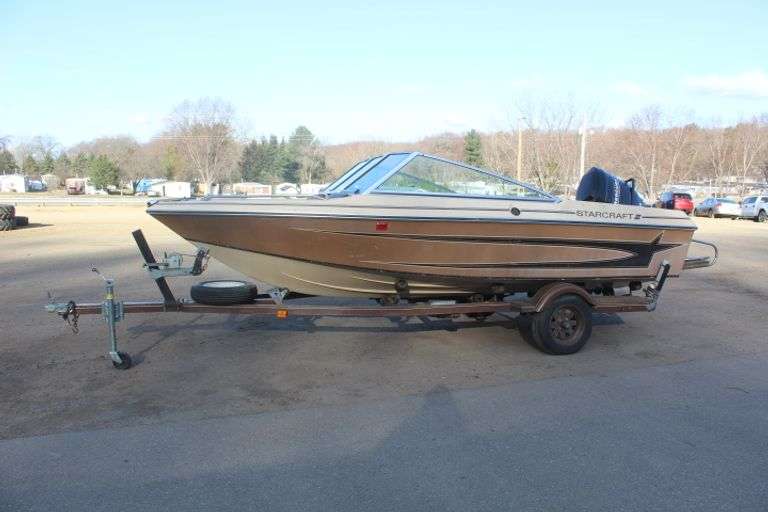 1986 Starcraft 16' boat w/motor & trailer Lee Real Estate & Auction