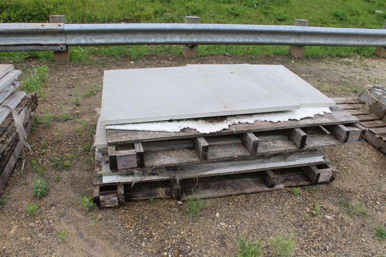 Pallet of precast cement pads - Lee Real Estate & Auction Service