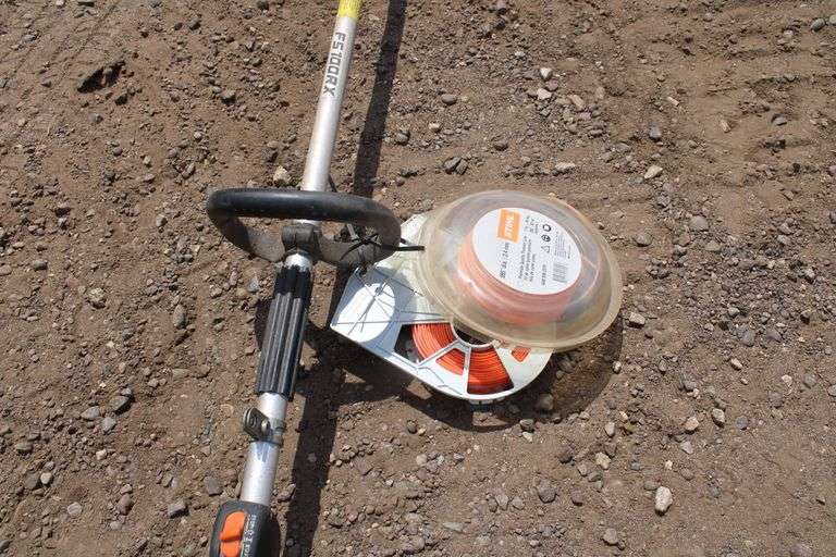 Stihl FS100 RX gas string trimmer w/extra string