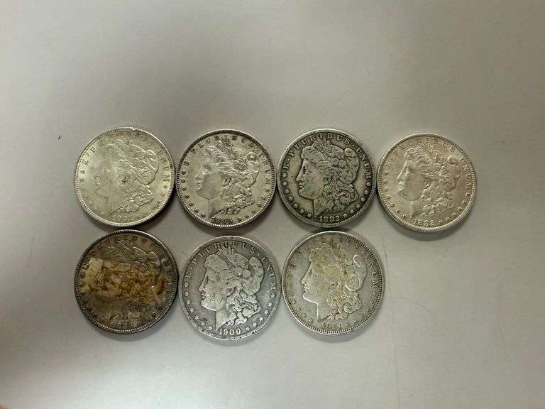 (7) Morgan Silver Dollars