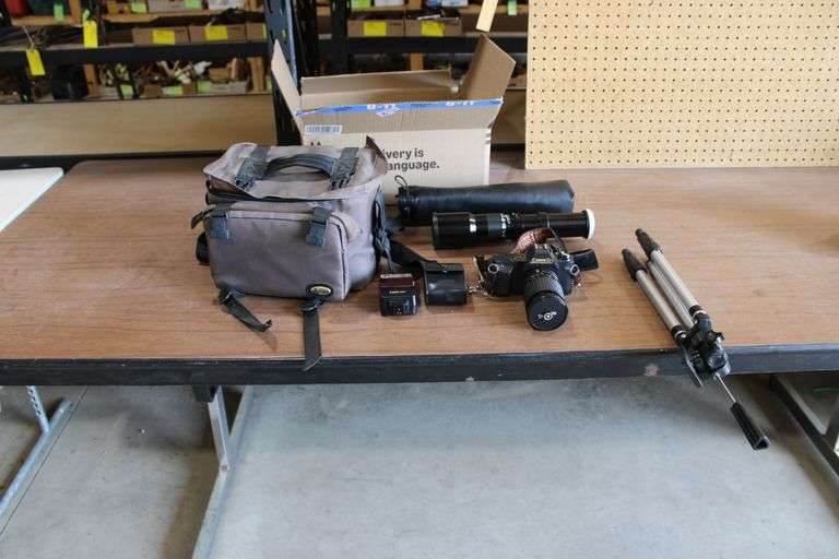 Canon T50 camera w/extra lens, bag, & tripod