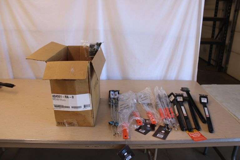 Box of new grilling tools