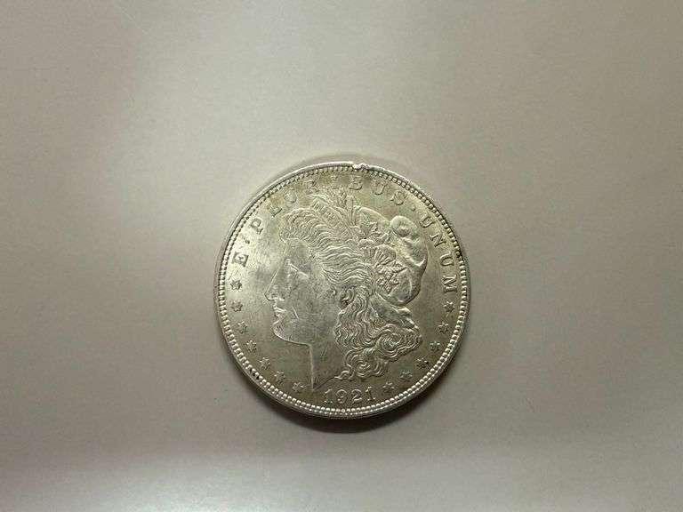 (7) Morgan Silver Dollars