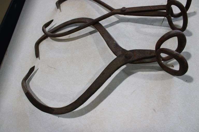 2 antique ice tongs