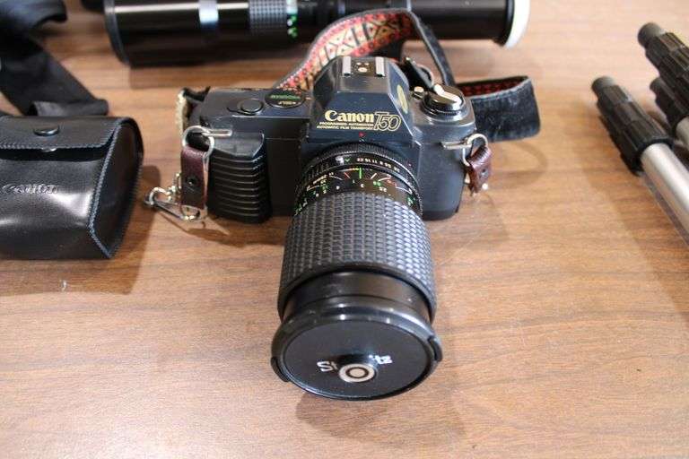 Canon T50 camera w/extra lens, bag, & tripod