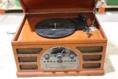 Crosley turn table/CD/Radio/Cassette player