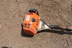 Stihl FS100 RX gas string trimmer w/extra string