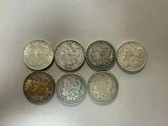 (7) Morgan Silver Dollars