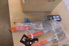 Box of new grilling tools