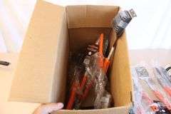 Box of new grilling tools