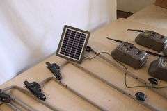10 Cuddeback game cameras w/poles & accessories