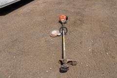 Stihl FS100 RX gas string trimmer w/extra string