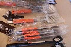 Box of new grilling tools